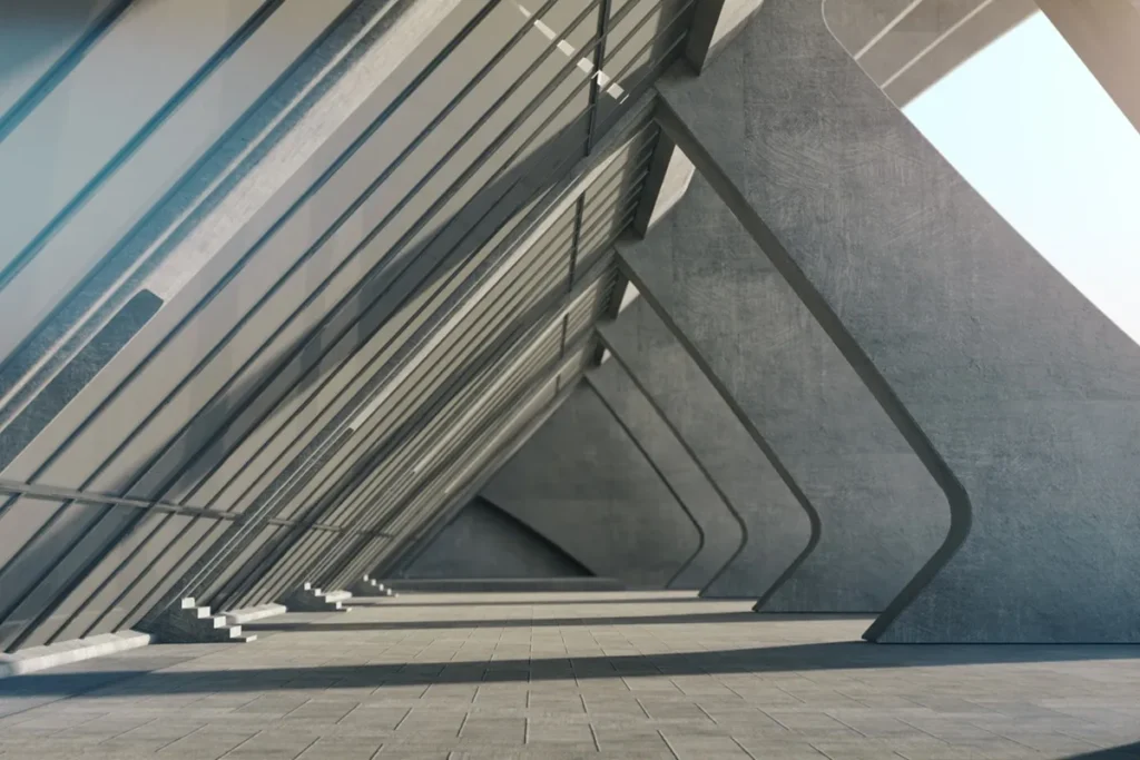 Corredor interno de arquitetura brutalista com pilares de concreto inclinados, linhas geométricas marcantes e luz natural filtrada.