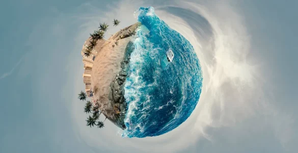 Efeito Little Planet mostrando uma praia com palmeiras e mar azul formando um mini planeta em imagem panorâmica 360 graus.