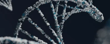 Estrutura de DNA em close com moléculas formando dupla hélice em fundo escuro